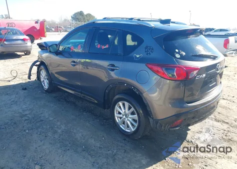 2014 Mazda Cx-5 Touring z USA, uszkodzony, nr VIN JM3KE2CY7E0353194